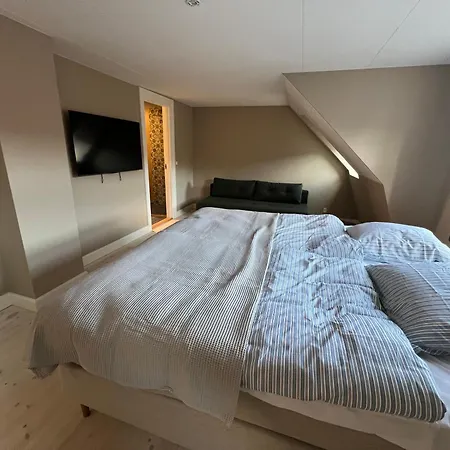 Byhuset - Penthouse Apartahotel 3*